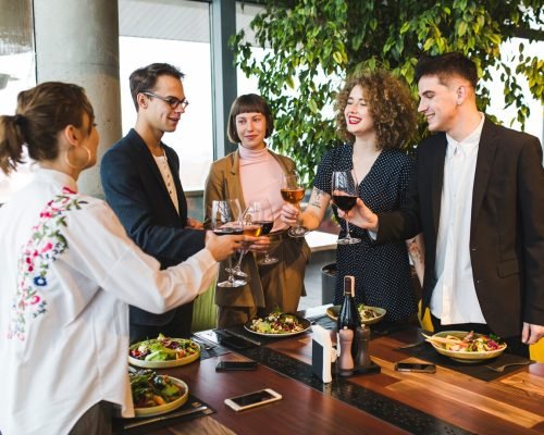 group-friends-eating-restaurant_23-2148006600